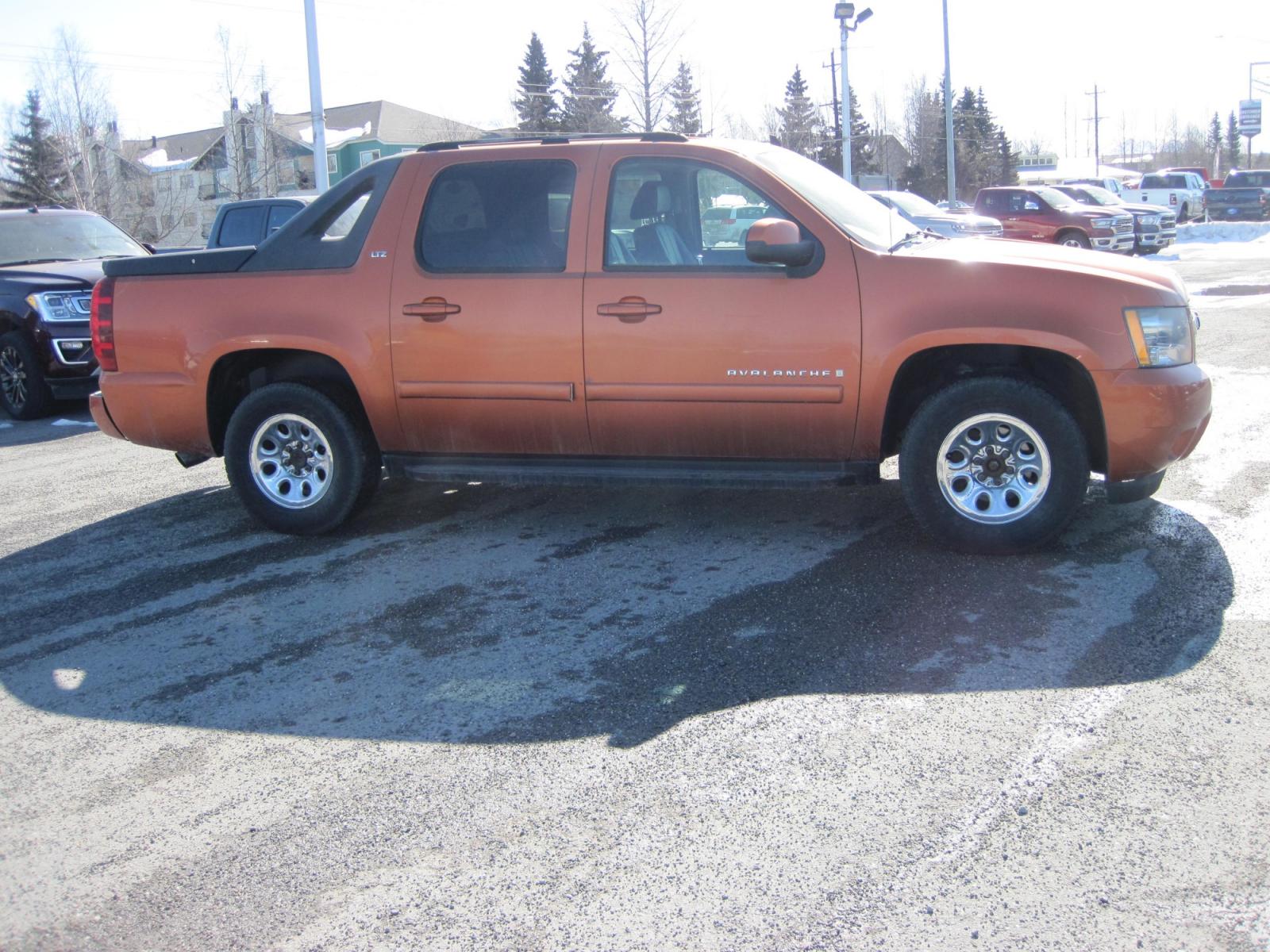 2007 Burnt Orange /Charcoal Chevrolet Avalanche LTZ 4WD (3GNFK12347G) with an 8 Cylinder Engine engine, Automatic transmission, located at 9530 Old Seward Highway, Anchorage, AK, 99515, (907) 349-3343, 61.134140, -149.865570 - Photo #3